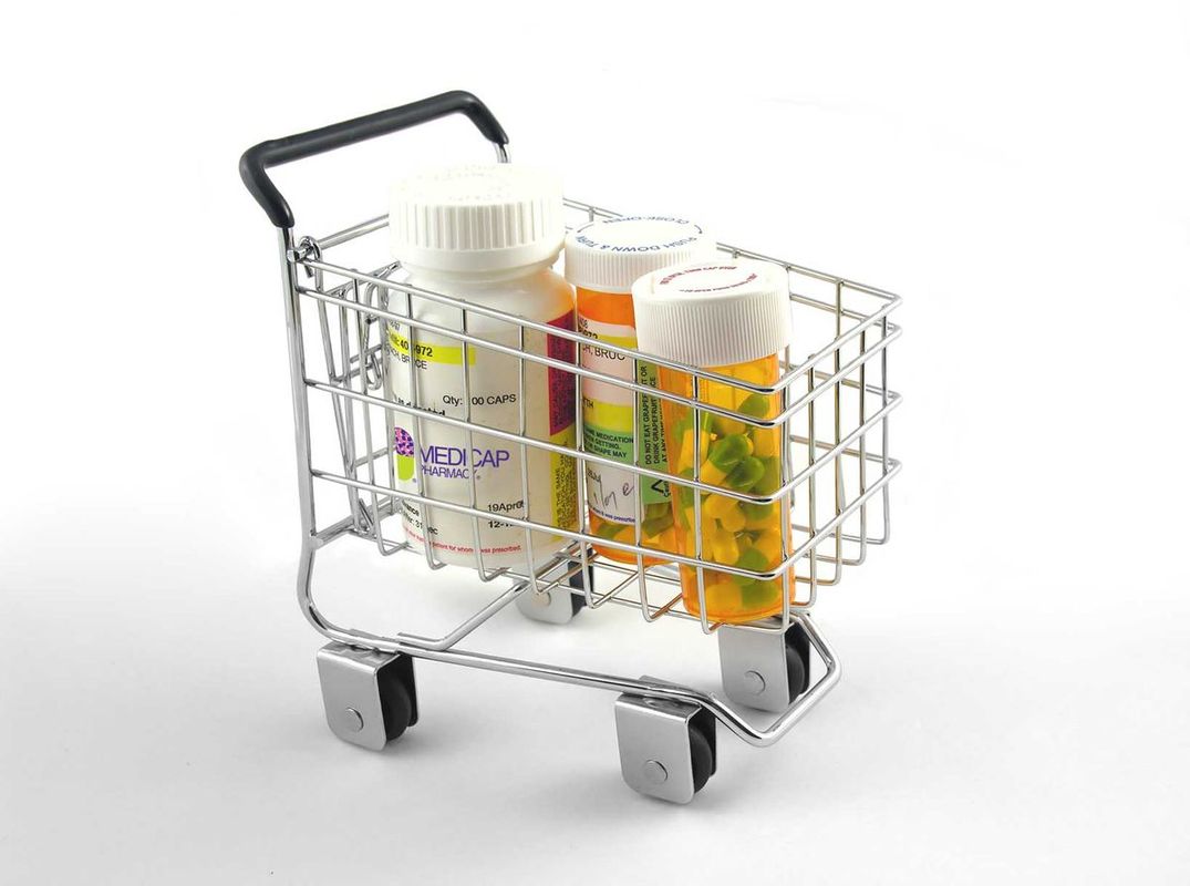 Pharmacist syncing a patient's prescriptions